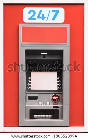 ATM machine, photo of one object in detail as a background, red color