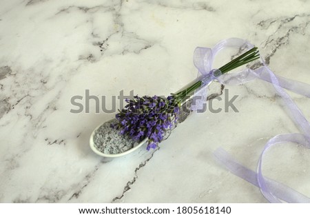 Home preparation of herbal ointment for the whole body from lavender, medicinal oil and salt for home relaxation.