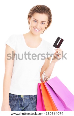 A picture of a beautiful woman shopping with a credit card over white background