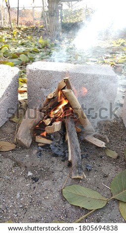 Making a fire for winter camp
