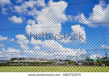   baseball field in summer sky                             