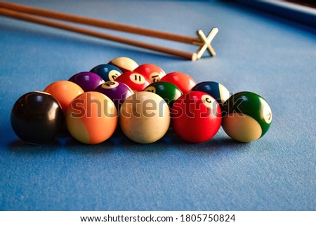 Billiards game ball with cue