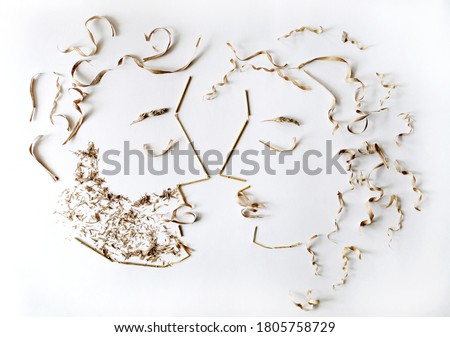 
Two lovers. People made from  natural materials. Portrait from natural materials. White background, top view.