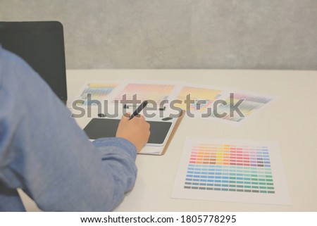 interior designer drawing on graphic tablet at office. artist working with computer at workplace. photographer retouch photo. design creativity idea concept