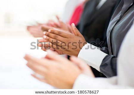 business group applauding for good news Royalty-Free Stock Photo #180578627