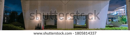 Photo of the entrance to the building taken at midnight