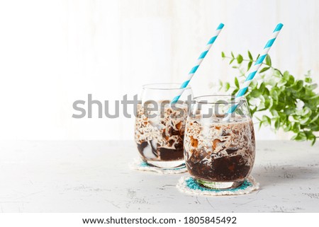 A drink of crashed coffee jelly in milk