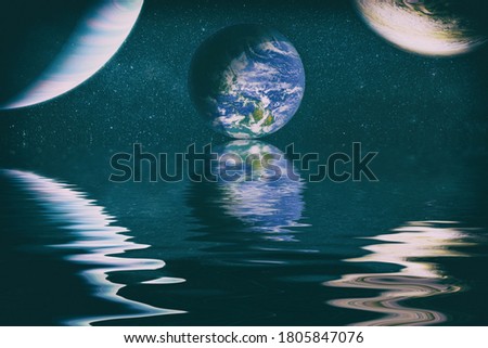 Beautiful unusual space planet in space reflected in water. Our beautiful Earth in reflection of water overlooking space ,galaxy stars night sky ,Elements of this Image Furnished by NASA ,
