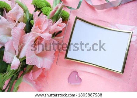 bouquet of pink gladioli and space for text. wedding card. congratulation. invitation