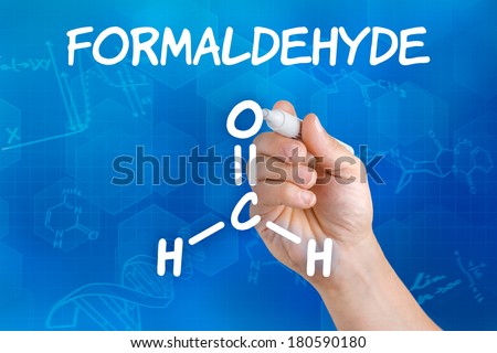 Hand with pen drawing the chemical formula of formaldehyde Royalty-Free Stock Photo #180590180