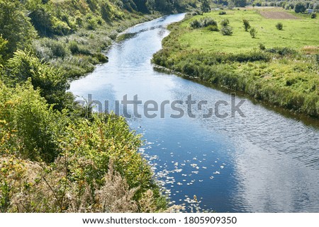 Summer sunny landscape with river