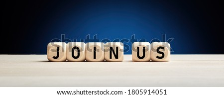 Join us concept on wooden cubes against blue background. Business job vacancy or community membership announcement concept.

 Royalty-Free Stock Photo #1805914051