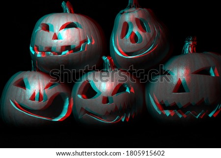Halloween pumpkins. Jack's lantern for holiday on black background. 3D virtual reality glitch effect