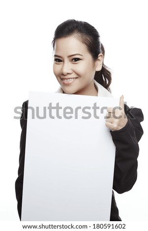Asian business woman holding blank whiteboard sign - Casual business woman in suit is holding blank billboard placard and showing its empty copy-space - Isolated on white background.