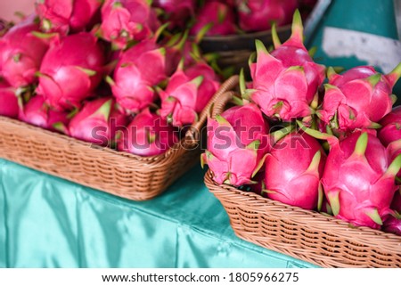 Dragon fruit in the basket for sale in the fruit market / Fresh Pitaya 