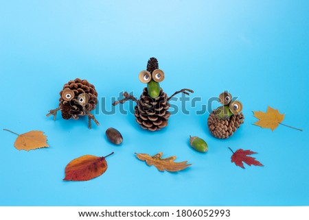 autumn or fall craft for kids made of leaf and pine cone, preschooler or toddler activity ideas