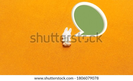 Happy Easter Bunny On Yellow Background Stock Photo
