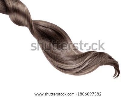 Brown shiny hair on white background, isolated Royalty-Free Stock Photo #1806097582
