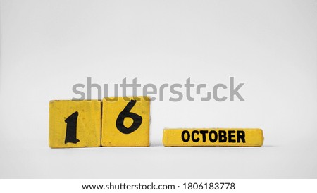OCTOBER 16 Wooden calendar. World Food Day. White background with space for your text
