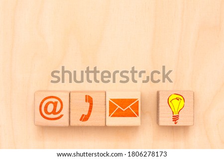 contact options printed on wooden cubes