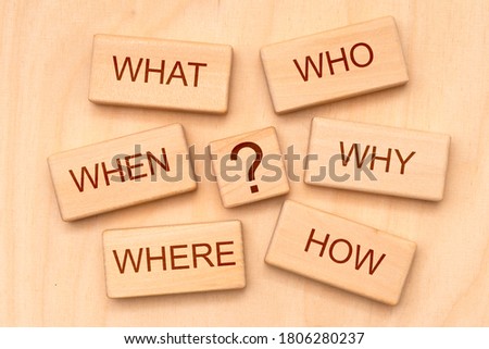 W-questions as basic for journalism printed on cubes Royalty-Free Stock Photo #1806280237