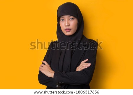 Asian business woman with formal outfit and elegant appearance. on yellow background
