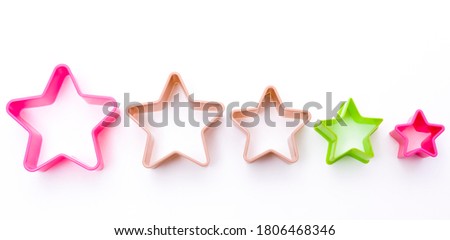 plastic form for cooking, five colorful stars shape. isolated on white background