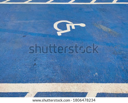 Parking area for the disabled with a sign.