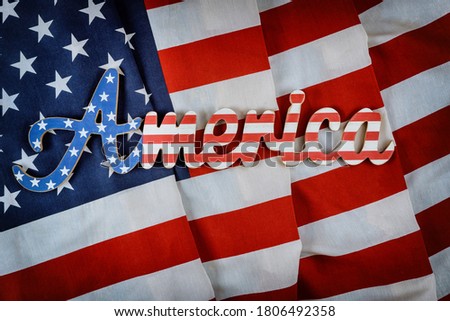 America sign decorated letter with patriotism federal holiday of the American flag background