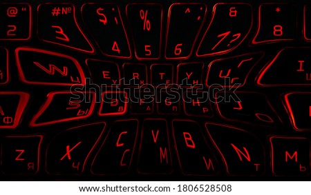 Computer keyboard in black and red colors abstract illustration. Computer techologies. Typing on the keyboard. Abstract background image. Red illumination of laptop buttons.