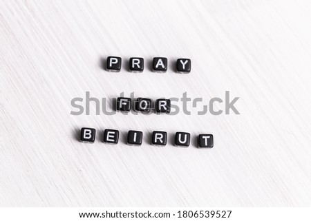 Pray for Beirut sign. Show of support in response to 2020 Lebanon Explosion. Message of solidarity and support. Words pray for Beirut on white background.