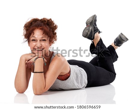 Senior woman working out at a fitness class