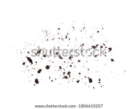 Scattered crumbs of chocolate sandwich cookies filled with sweet cream flavored isolated on white background. Royalty-Free Stock Photo #1806610207