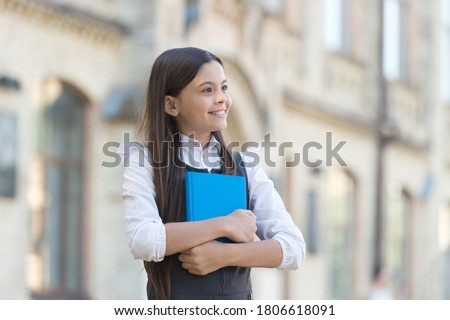 Open lesson. Little child hold lesson book outdoors. Back to school. Private lesson. Class and tutorial. Knowledge day. September 1. Formal education. School library. Learning never ends, copy space. Royalty-Free Stock Photo #1806618091