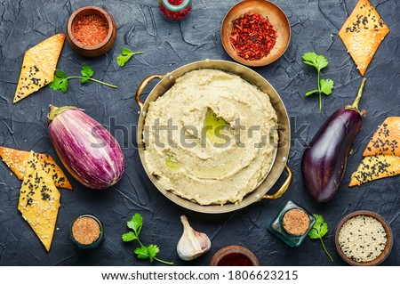 Babaganush or eggplant caviar from baked eggplant Royalty-Free Stock Photo #1806623215