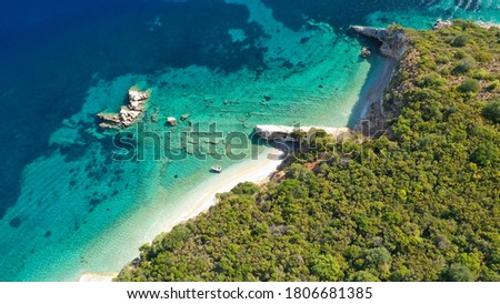 Aerial drone photo of tropical exotic bay with turquoise rocky seascape and beautiful sandy beach in Caribbean destination island