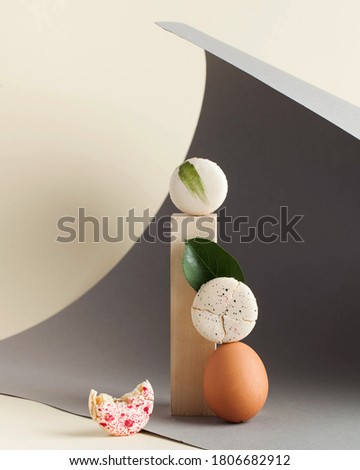 Modern still life of macaroon cakes. Poster, greeting card with macaroni. Art food photo. Copy space.