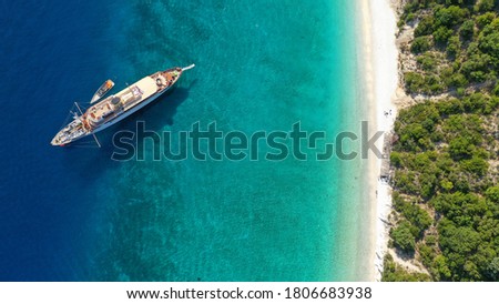 Aerial drone photo of beautiful paradise turquoise sea sandy beach and bay of Gidaki accessible by short hiking in beautiful Ionian island of Ithaki or Ithaca, Greece