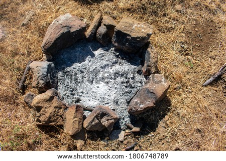 simple outdoor fireplace with ashes