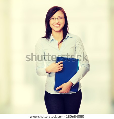 Student woman with note pad