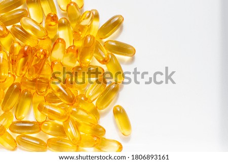 Fish oil capsules pill banner with free space. Omega 3. Concept of healthcare. Top view, dietary supplements.