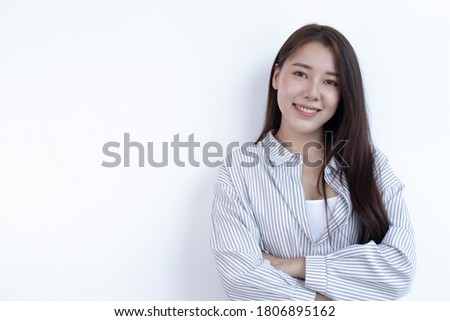 White background picture ,Young business women in Asia are smiling, Text input,  Business professional Concept.