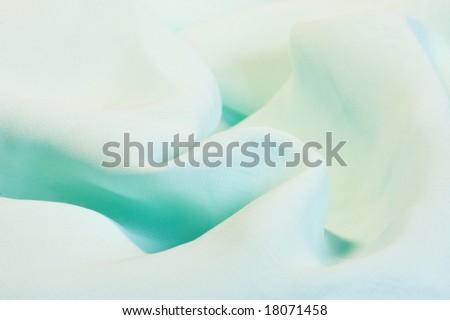 Light blue fabric for background.