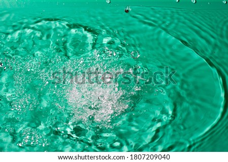 splash of water on black isolated background