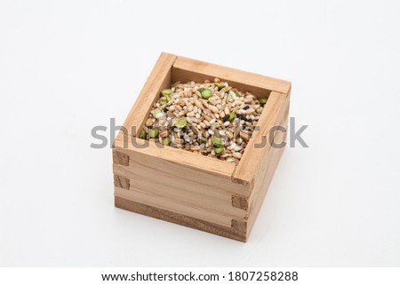 Miscellaneous grains in measure wooden cup
 Royalty-Free Stock Photo #1807258288