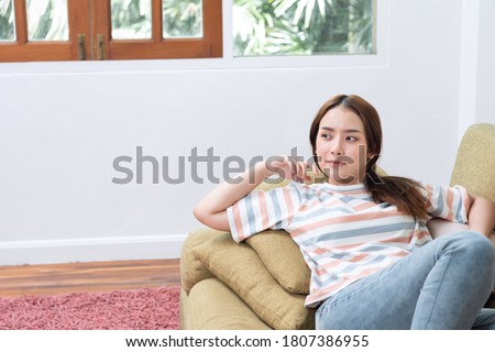 young woman relax on sofa at home