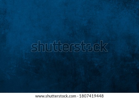 Darl blue scraped wall grungy background or texture  Royalty-Free Stock Photo #1807419448