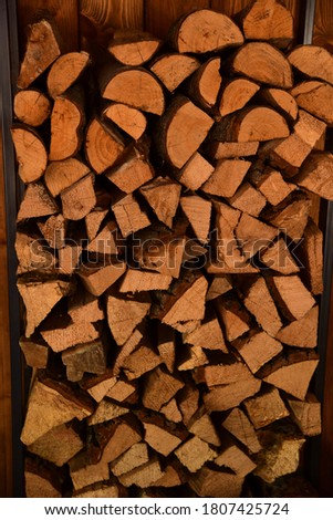Abstract photo of heap of natural wooden chopped logs background
