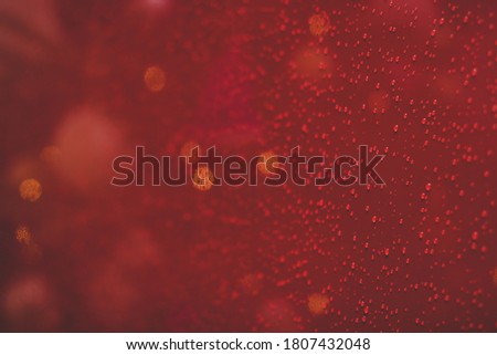 Christmas blurry festive background concept December holidays red color and illumination glare abstract unfocused effect pattern picture for some advertising wallpaper poster 