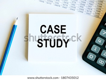 Notepad with text CASE STUDY on a white background, near calculator and office supplies. Business concept.